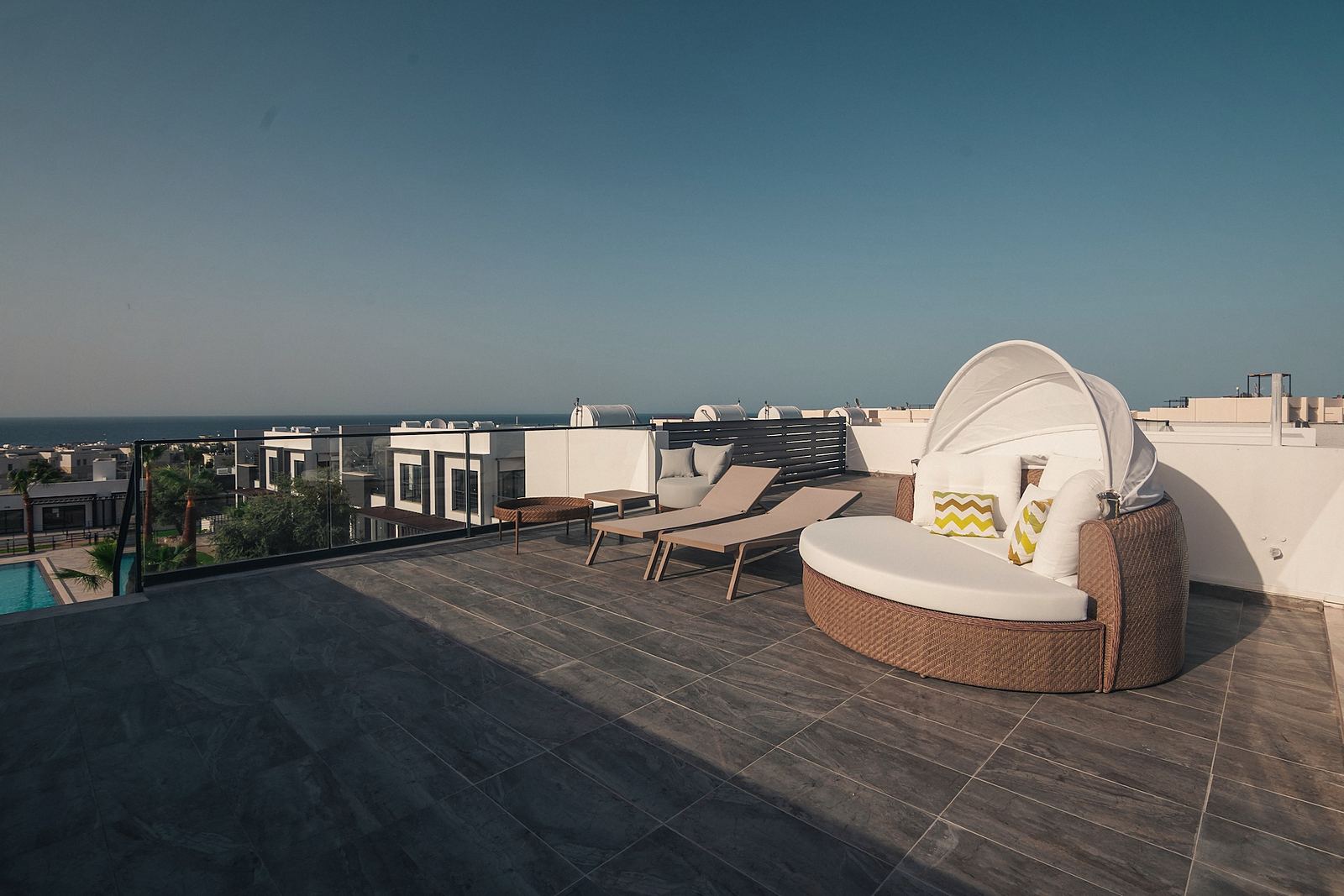 Roof terrace with daybed at sunset
