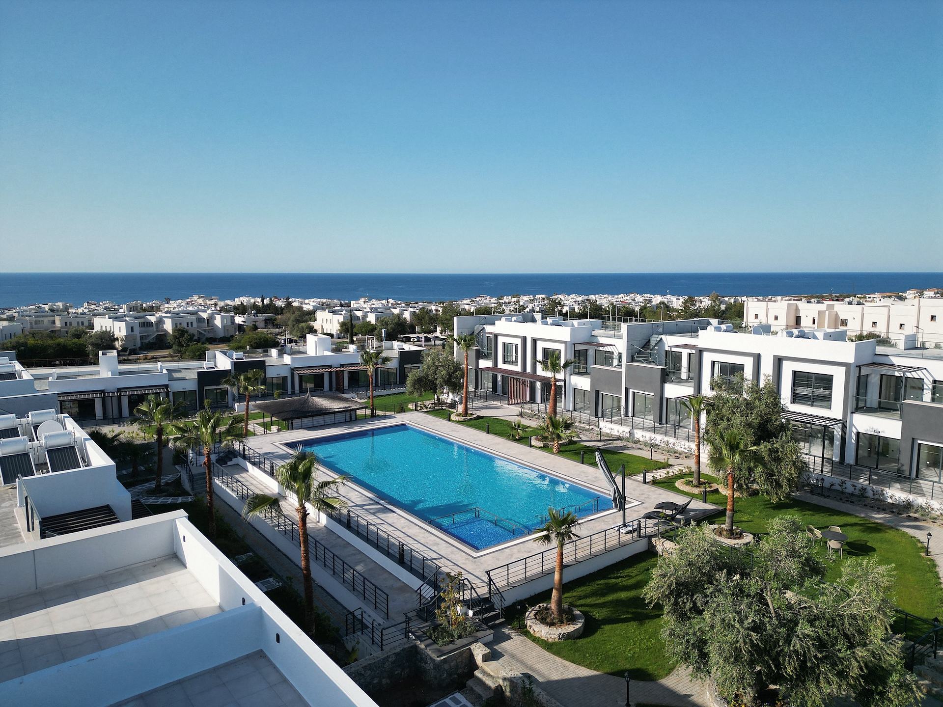 Palm Garden from above with the sea behind
